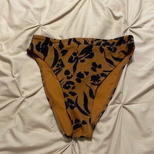 Printed high waisted bikini bottoms. Size medium.
